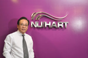 Dr. Bato with nuhart logo